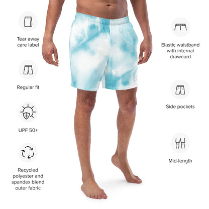 Blue tie dye mens trunks trunks on male model with an angled front view showing features