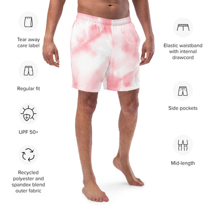 Pink tie dye mens trunks trunks on male model with an angled front view showing features