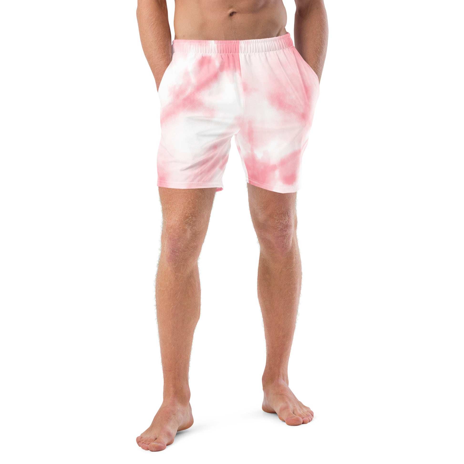 Pink tie dye mens trunks trunks on male model with a front view