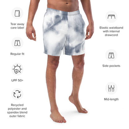 Purple tie dye mens trunks trunks on male model with an angled front view showing features