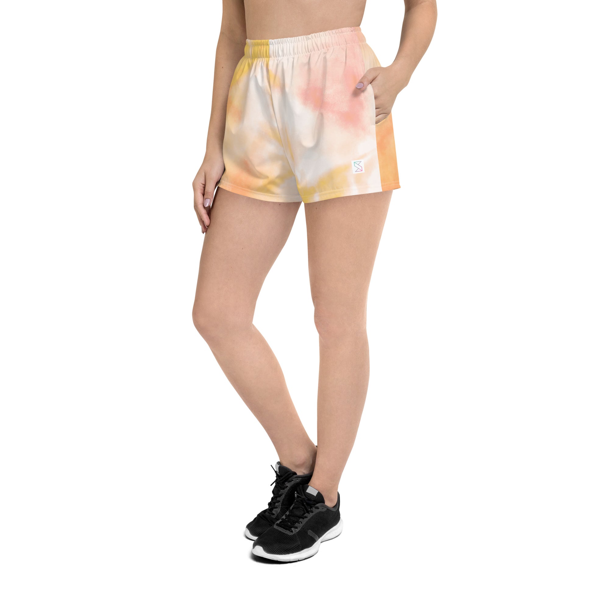 Sunburst tie dye womens shorts trunks on female model with an angled side view